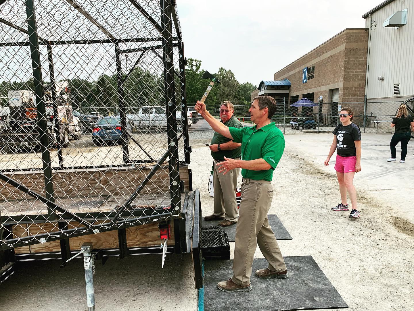 A guest taking a throw at a Mobile Axe workplace event