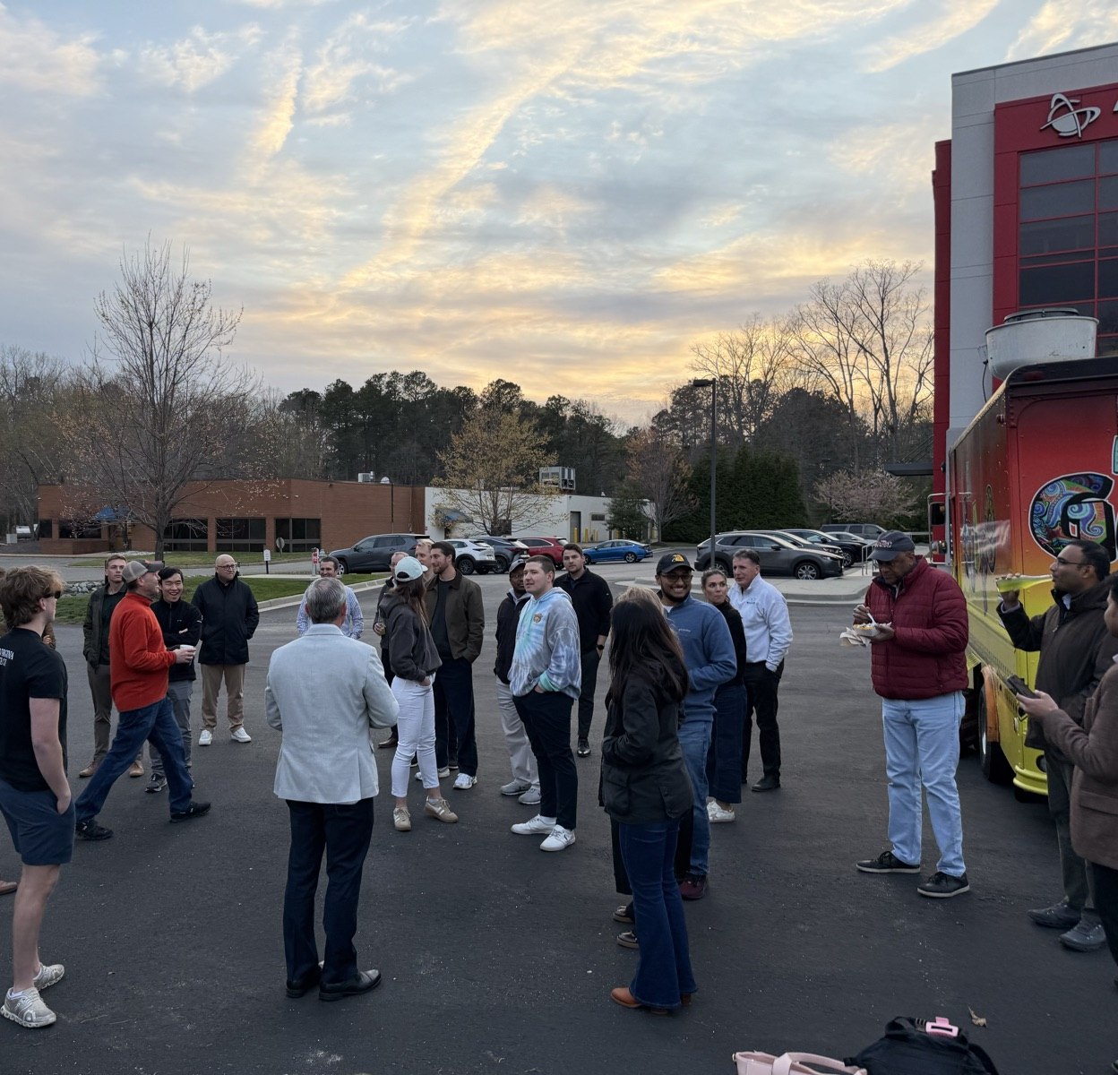 Corporate group at a Mobile Axe RVA event with a food truck